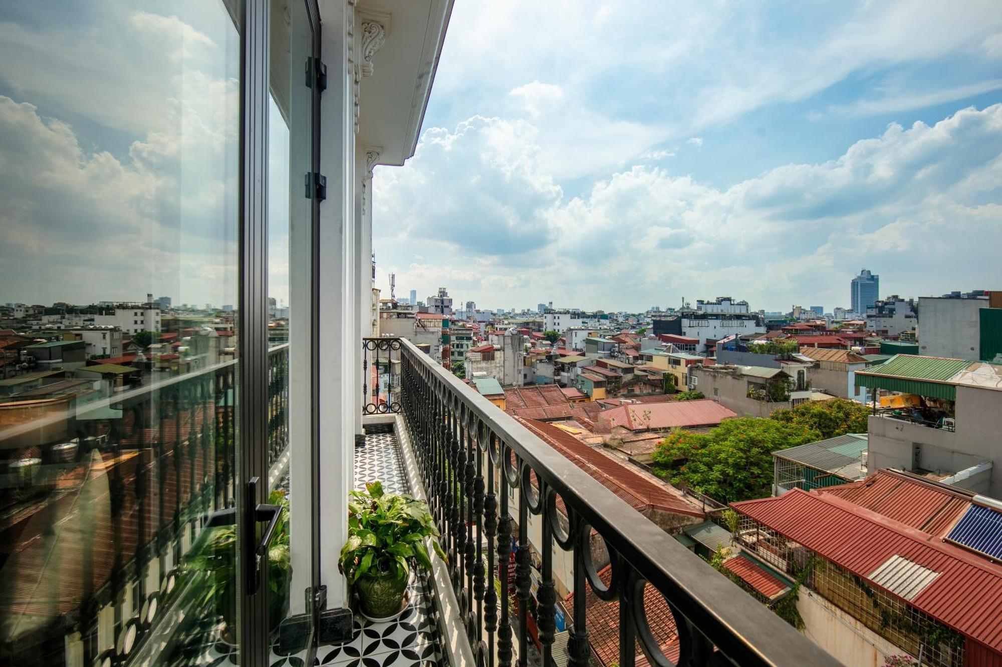 May De Ville Crown Hotel Ханой Екстер'єр фото A balcony in Ho Chi Minh City, Vietnam